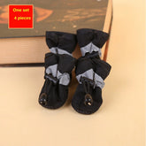 Set of four black dog rain boots