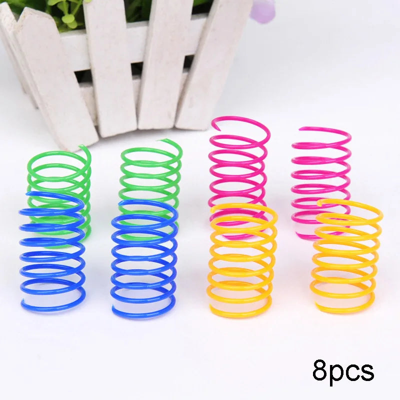 Eight colorful cat toy springs displayed upright